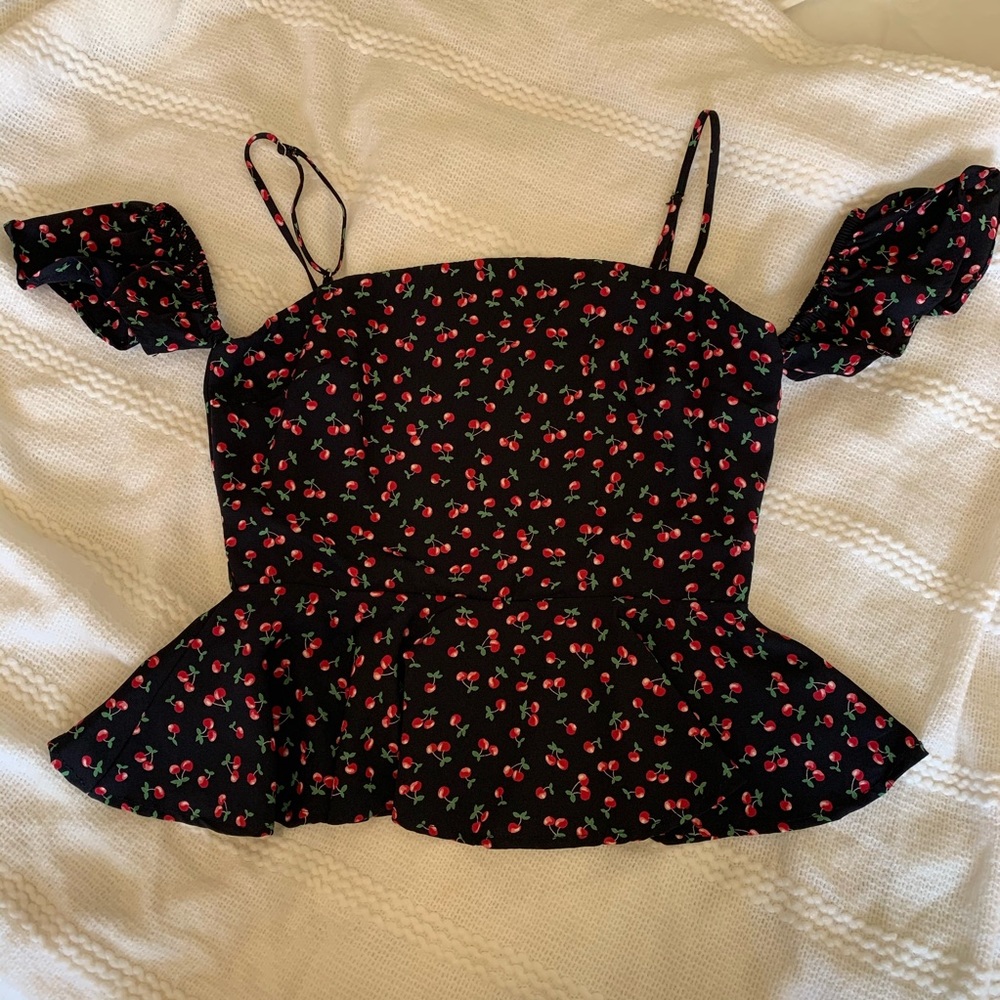 In perfect condition, off the shoulder top.